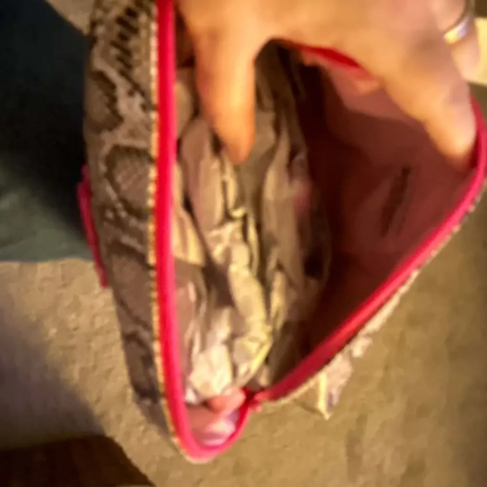 Juicy Couture Faux Snakeskin Pouch with Hot Pink JC Logo‎ and Zipper Detail